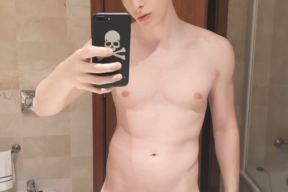 Sexy boy taking a nude selfie