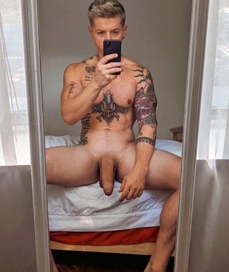 Tattooed nude mirror boy