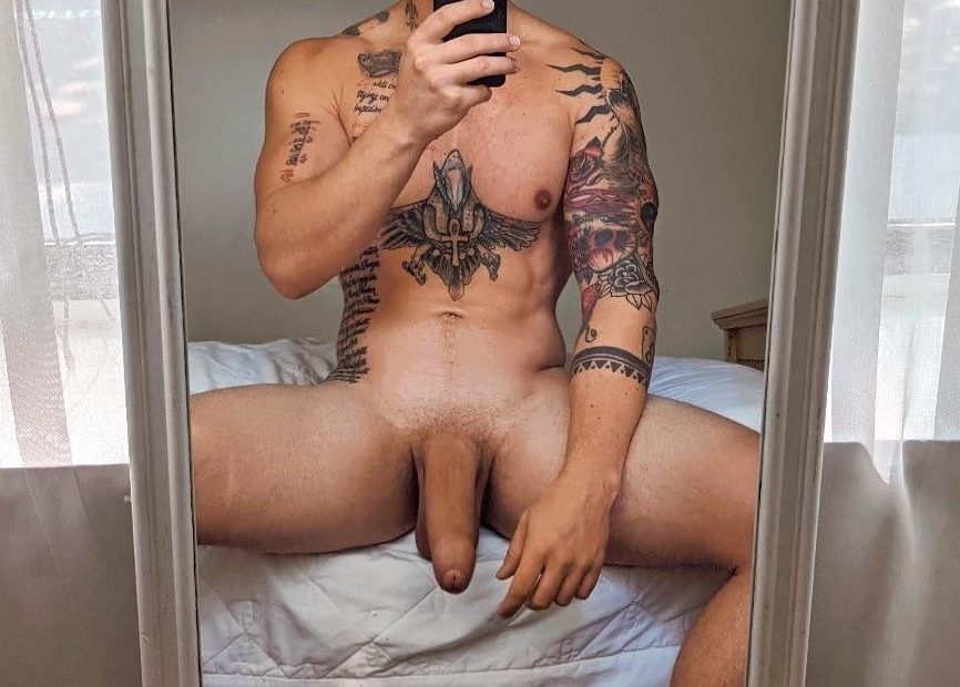 Tattooed nude mirror boy